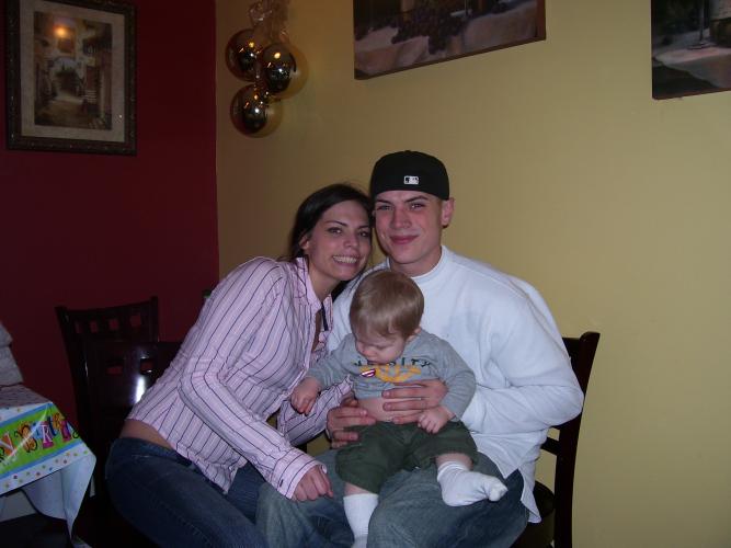 Taylor and Kyle holding their cousin David 12/2/06