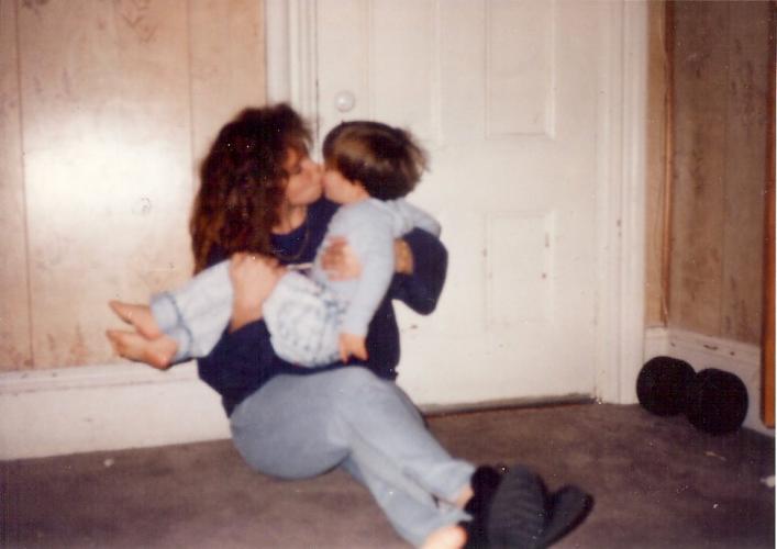 Patty giving Kyle kisses